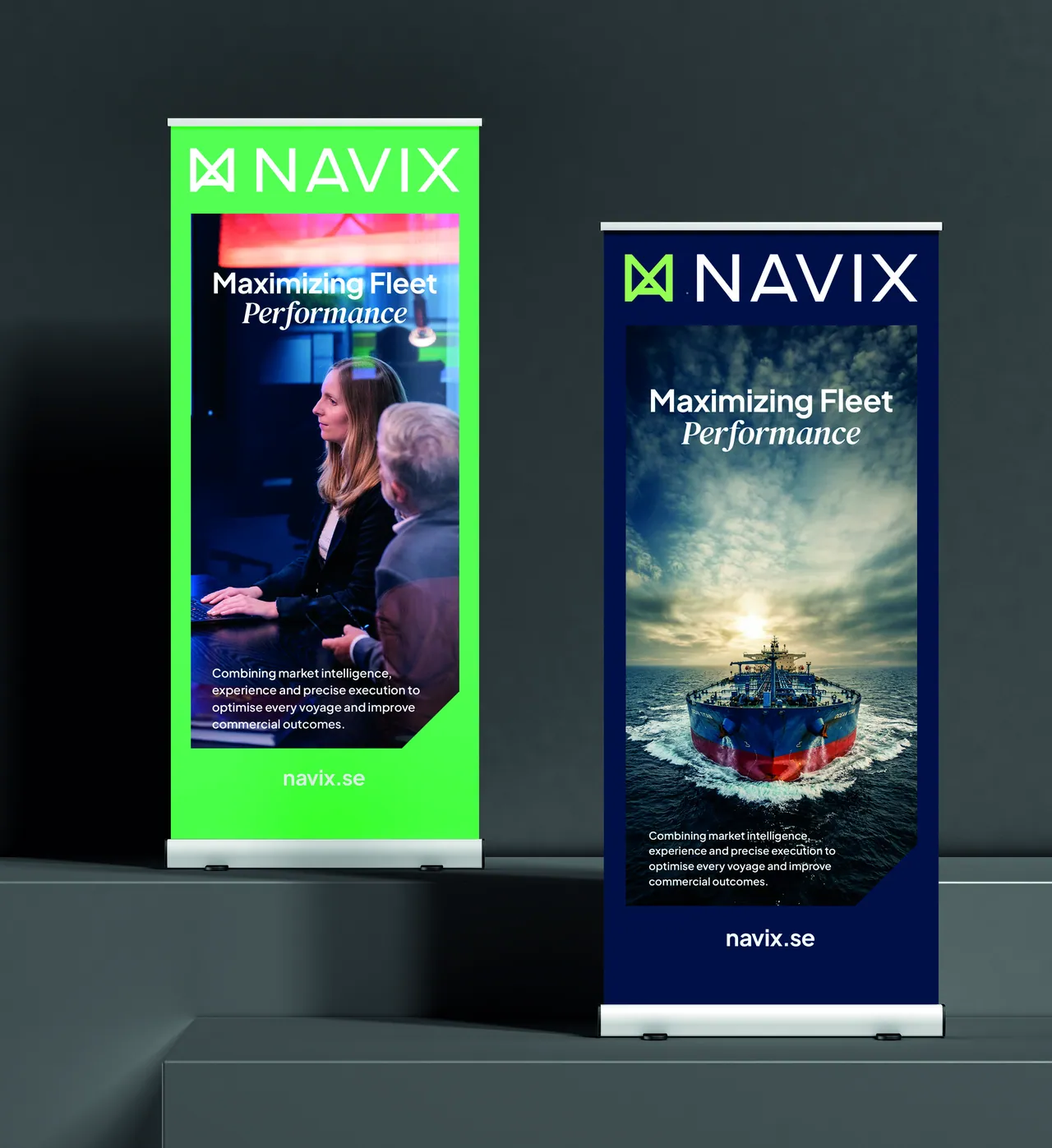 Two Navix roll-up banners, one Digital Green and one Deep Sea Blue, both headed Maximizing Fleet Performance.